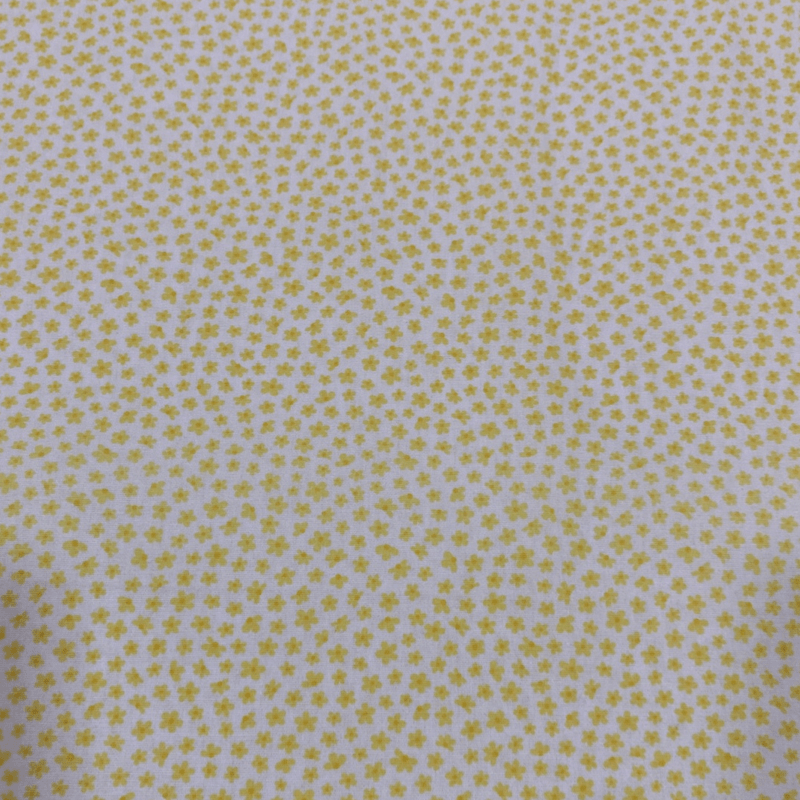 Tricoline estampado florzinha amarela fundo branco 