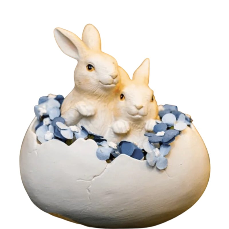 Coelhos no ovo com flores azuis 